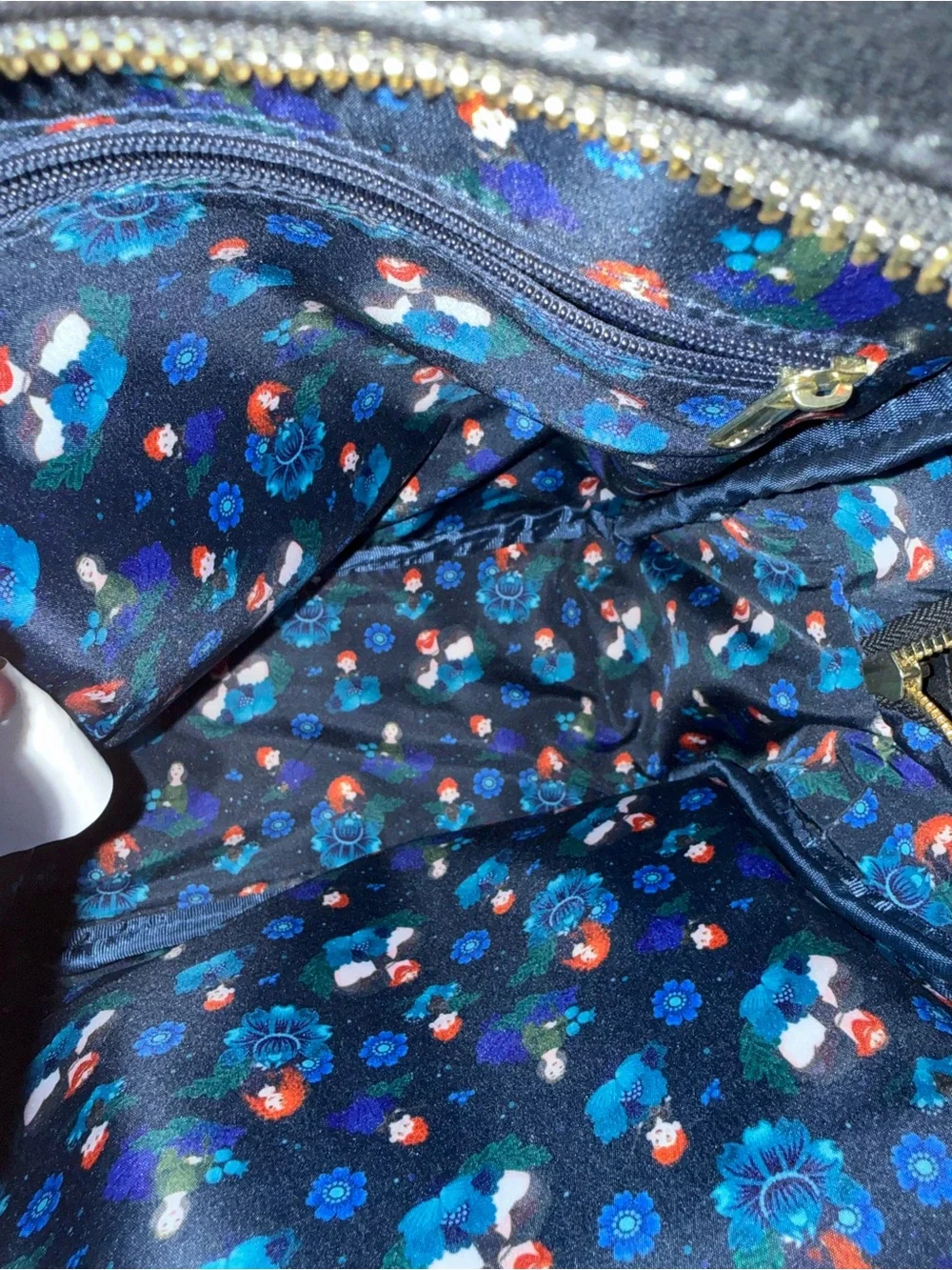 Loungefly Pixar Black Mini Backpack with Blue Floral Print